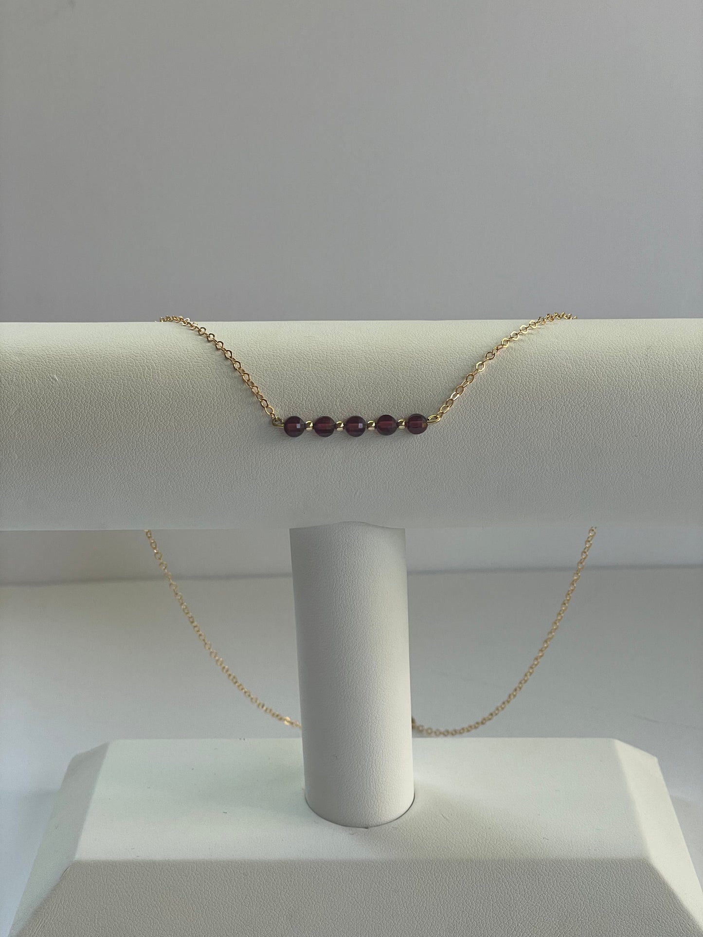 Garnet coin shape necklace